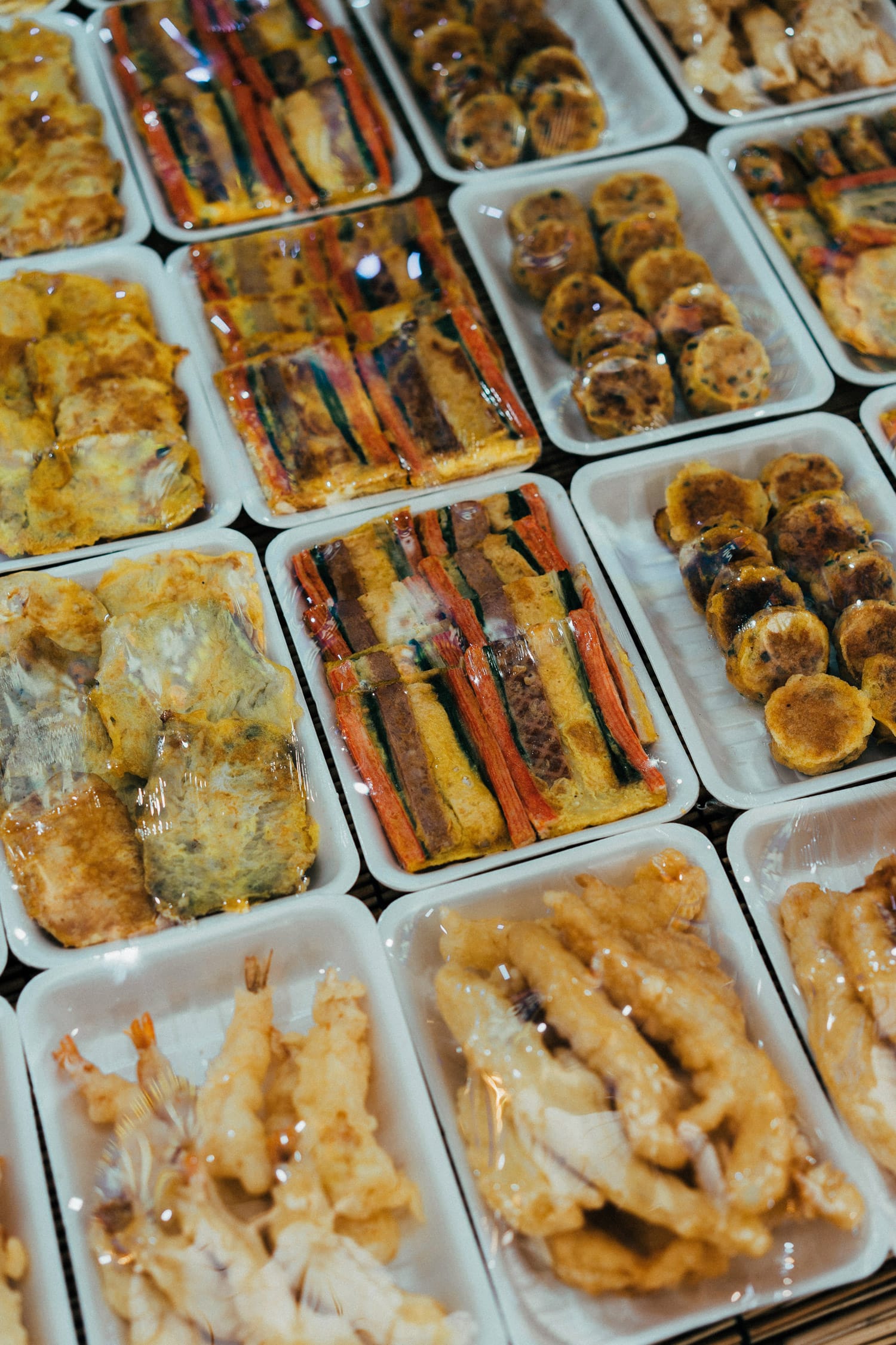 Food wrapped in plastic containers.