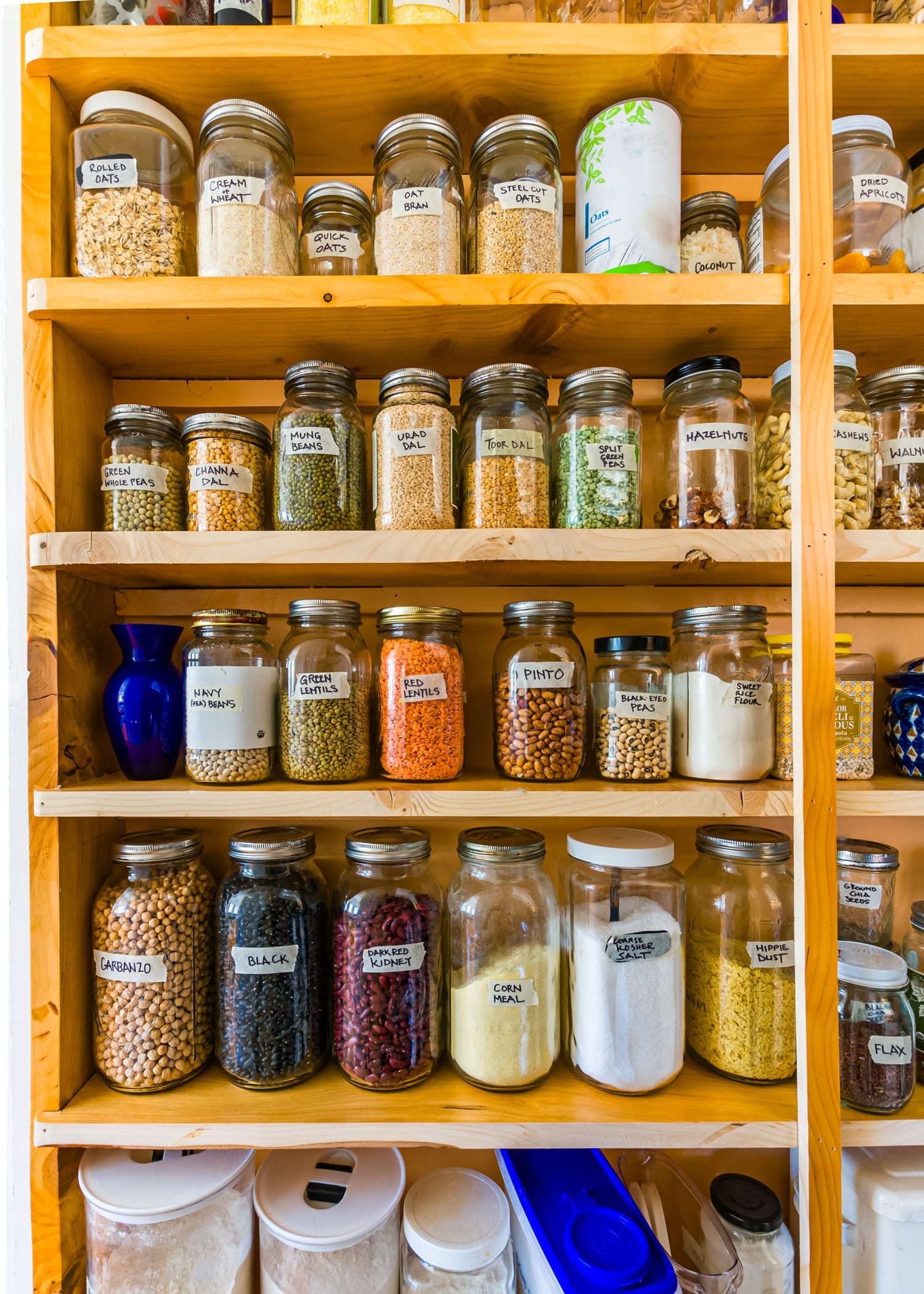 pantry filled with repurposed jars for long term food storage