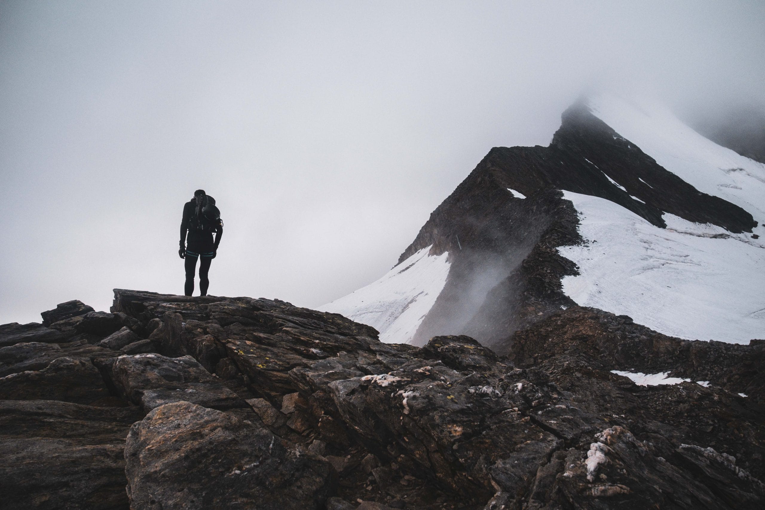 Kilian Jornet on the top of the rocky mountain